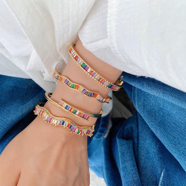 Irregular shape rainbow cubic zircon gold plated copper bangle