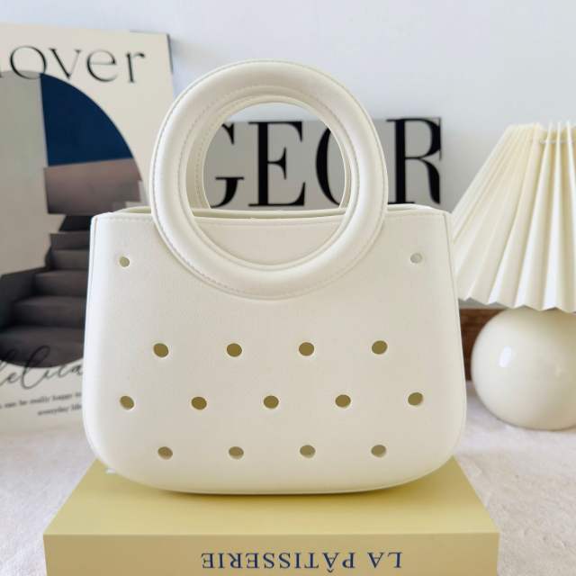New ladies handbag cartoon love fashion round travel storage bag eva hole bag beach bag