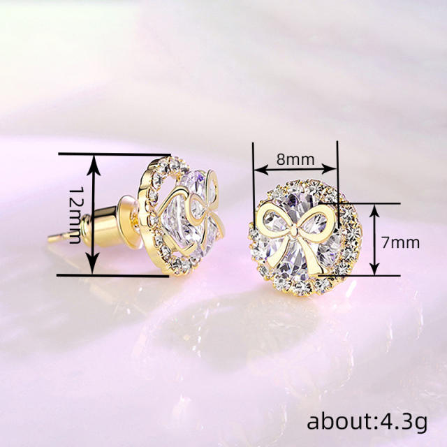 Sweet round shape diamond studs earrings with bow