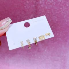 Delicate cubic zircon gold plated copper huggie earrings set for women
