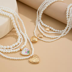 Baroque multi layer pearl bead heart pendant long necklace