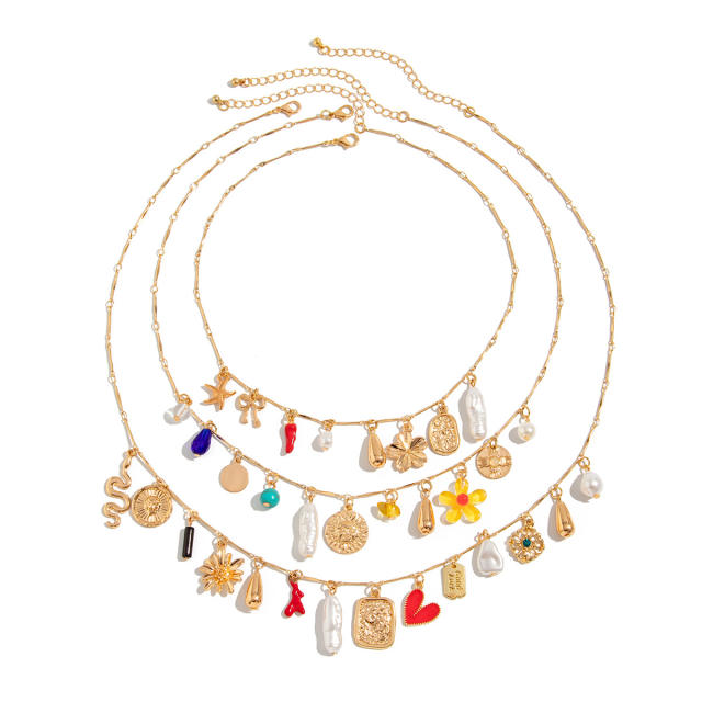 Boho multi element charm three layer necklace set