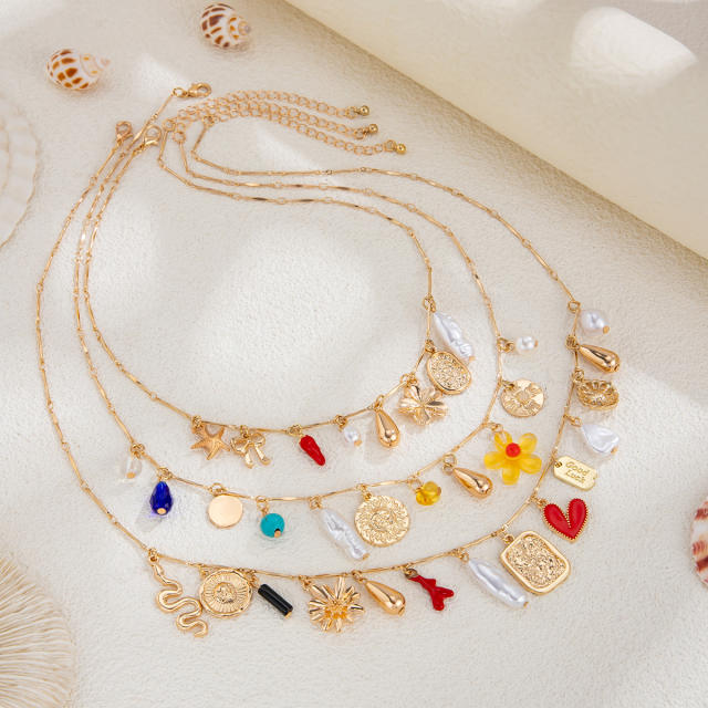 Boho multi element charm three layer necklace set