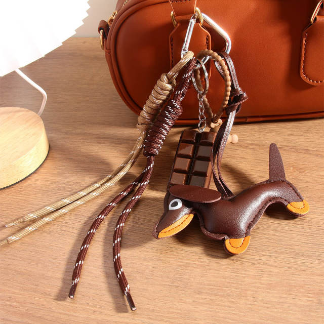 Vintage miu style leather sausage puppy woven rope chocolate bag pendant lanyard keychain