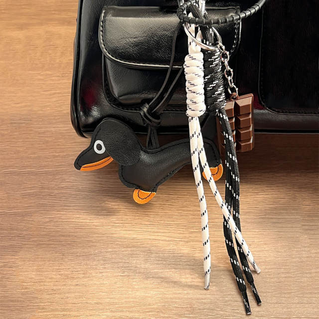 Vintage miu style leather sausage puppy woven rope chocolate bag pendant lanyard keychain