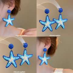 Rafi Grass Woven Starfish Earrings seaside ocean earrings