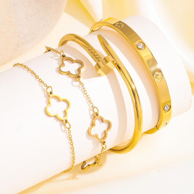18KG classic hollow clover nail pattern stainless steel bracelet bangle