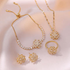 Diamond hollow clover rotatable stainless steel chain necklace bracelet suit
