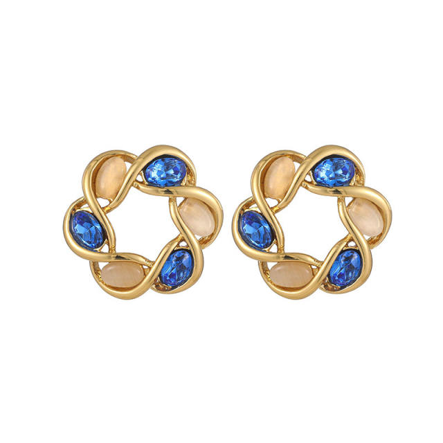 Elegnat opal stone inlaid twisted circle stainless steel earrings