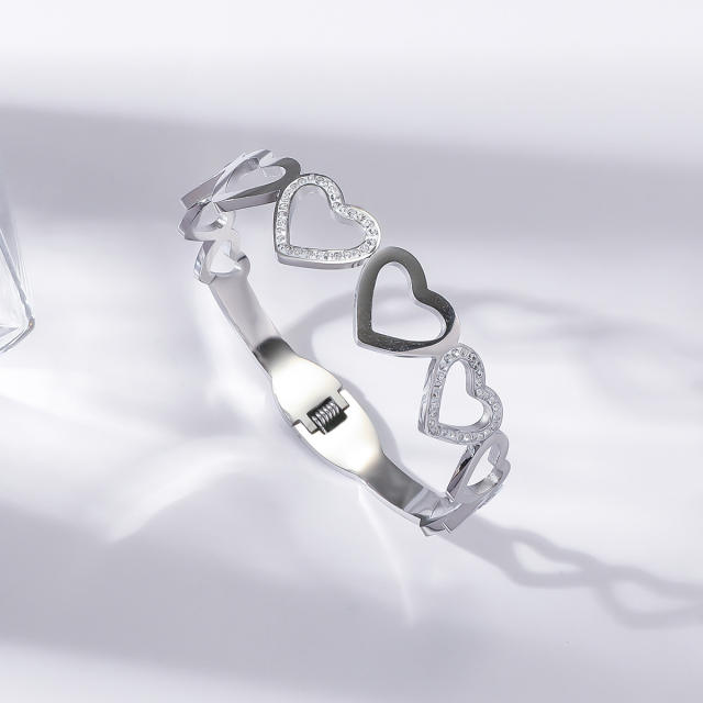 Delicate hollow out heart rhinestone setting stainless steel bangle bracelet