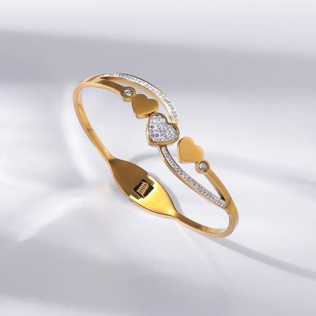 Delicate hollow out heart rhinestone setting stainless steel bangle bracelet
