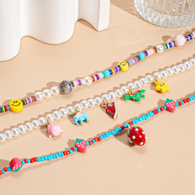 Sweet Imitation Pearl Strawberry Smiley Face Beaded Necklace