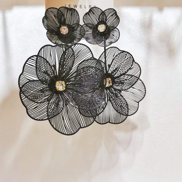 Original golden pendant hollow leaf flower earrings