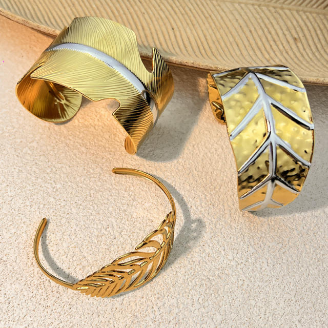 Stainless steel bangle bracelet plated with 18K two tone leaf design bangle bracelet