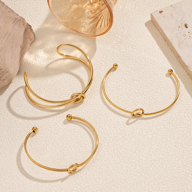 Hot sale knotted design stainless steel cuff bangle bracelet arm bangle