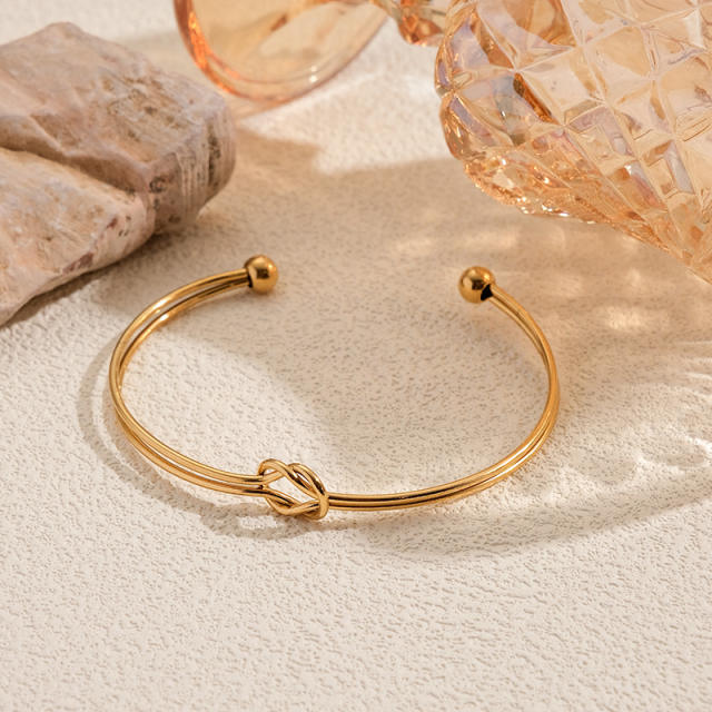 Hot sale knotted design stainless steel cuff bangle bracelet arm bangle