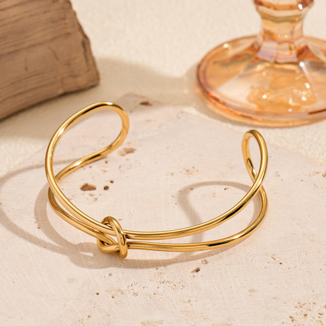 Hot sale knotted design stainless steel cuff bangle bracelet arm bangle