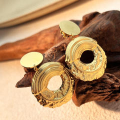 Eleagnt round piece hammer pattern stainless steel earrings