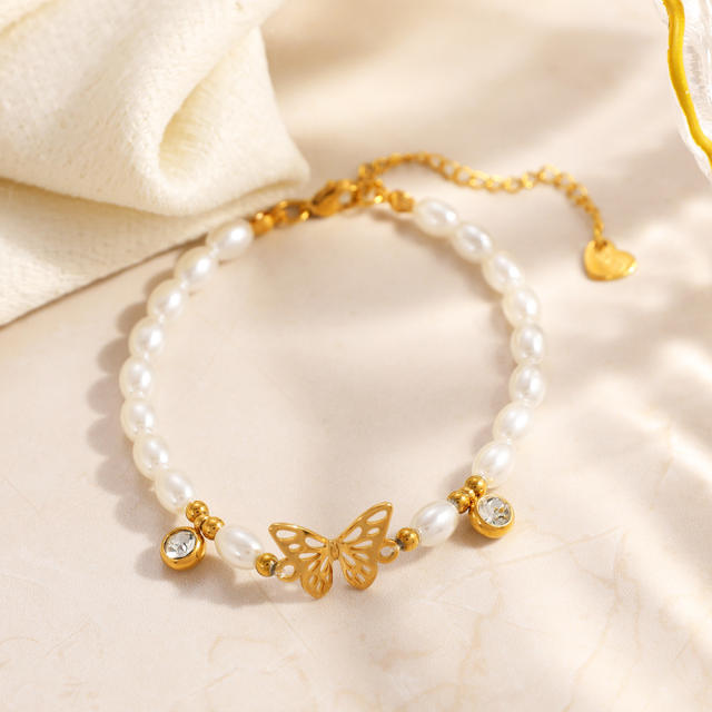 18KG earl spring hollow out butterfly pearl bead stainless steel bracelet