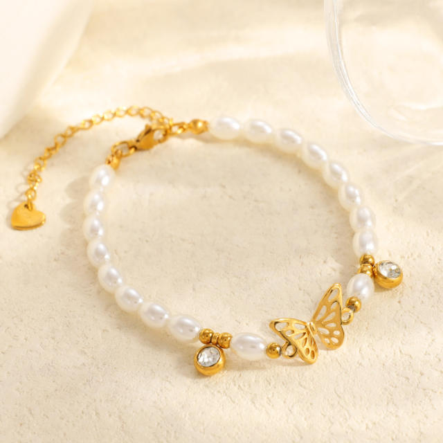 18KG earl spring hollow out butterfly pearl bead stainless steel bracelet
