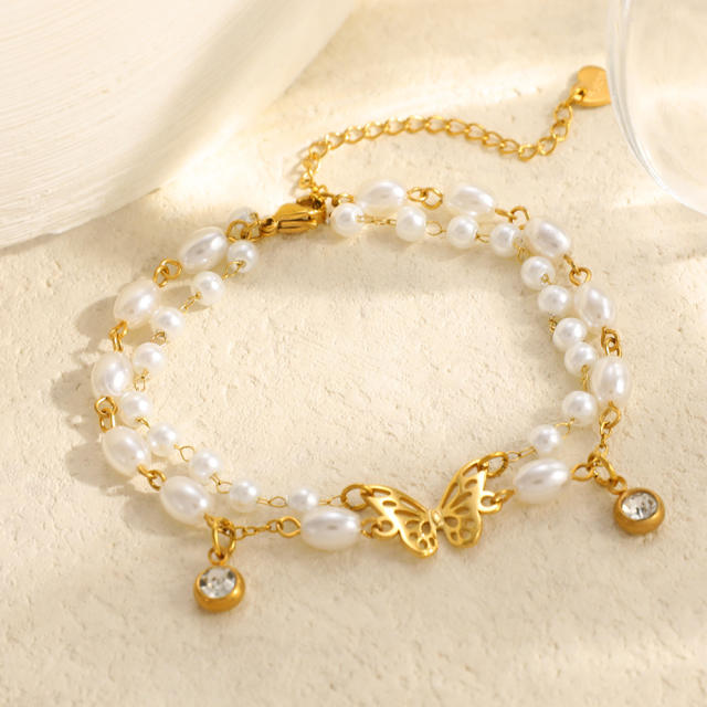 18KG earl spring hollow out butterfly pearl bead stainless steel bracelet