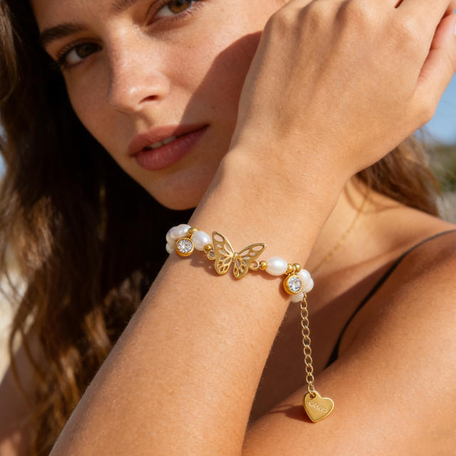 18KG earl spring hollow out butterfly pearl bead stainless steel bracelet