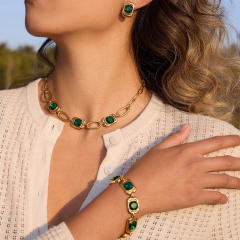 Green glass crystal inlaid stainless steel bracelet earrings set