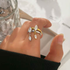 Delicate horse eye cubic zircon tassel stainless steel rings
