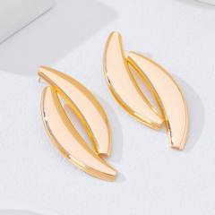 Exaggerated gold color consie metal earrings
