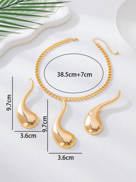 Exaggerated gold color drop design metal necklace earrings set