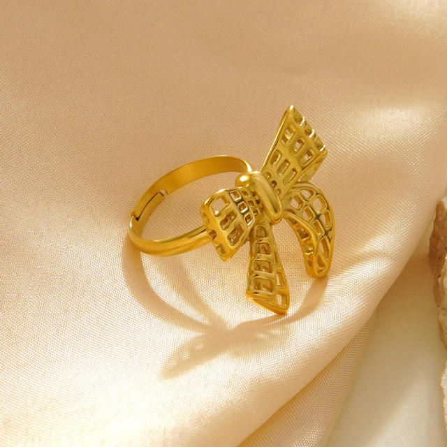 Hollow out stereo bow stainless steel rings