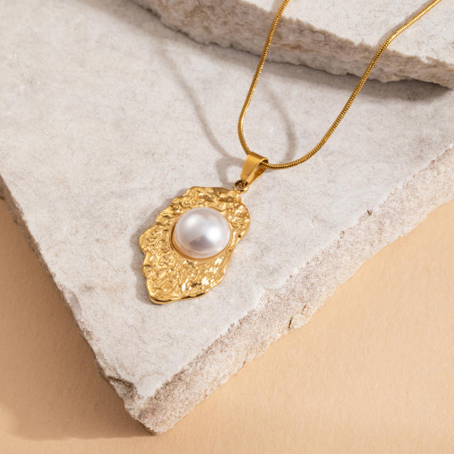 Hammer pendant with pearl inlaid stainless steel necklace