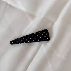 Black polka dot-small triangle clip