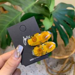 Clear sunflower side clip