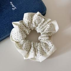 Gentle and sweet polka dot scrunchie elegant bun hairstyles