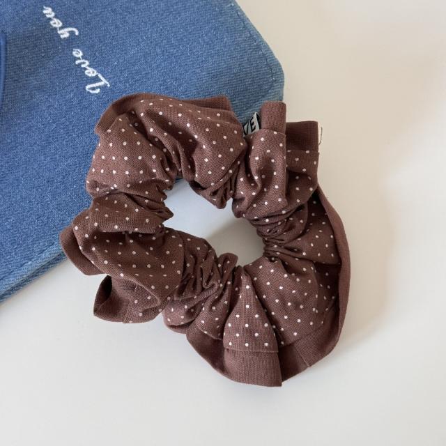 Gentle and sweet polka dot scrunchie elegant bun hairstyles
