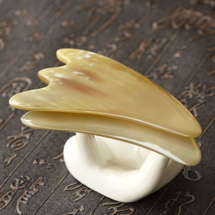 Horn triangular beauty scraping board