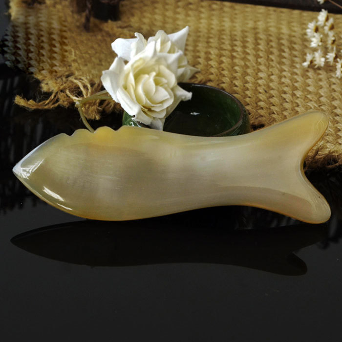 Fish shaped yak horn beauty scraping board