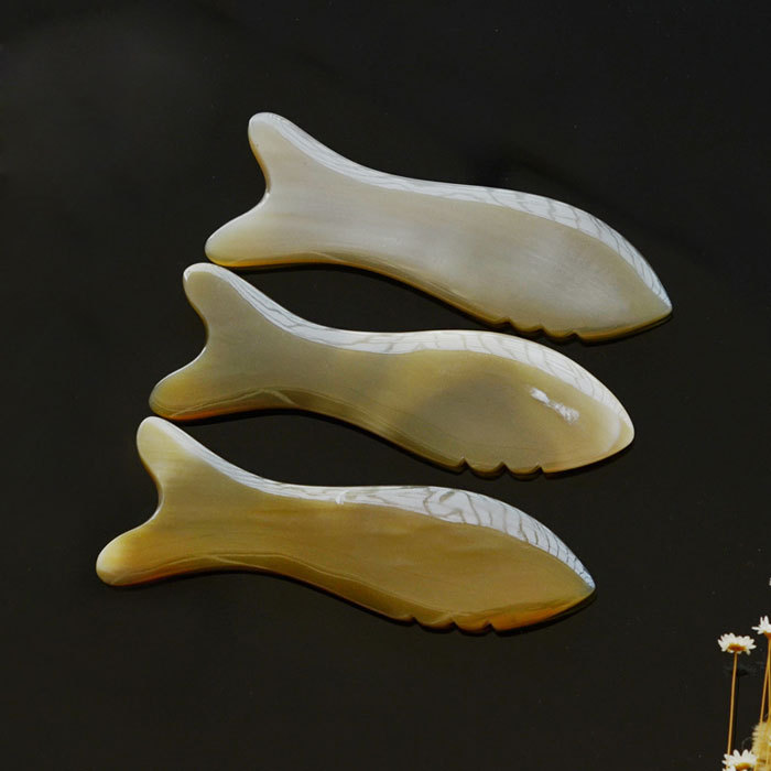 Fish shaped yak horn beauty scraping board