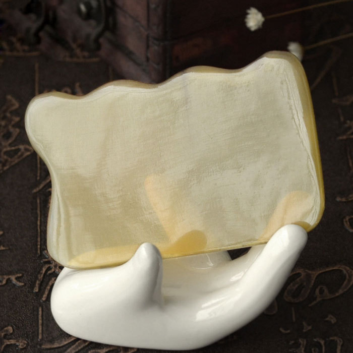 Ox horn wave shaped scraping board A