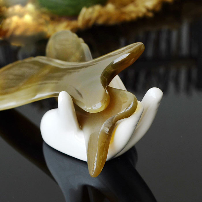 Fish shaped yak horn beauty scraping board