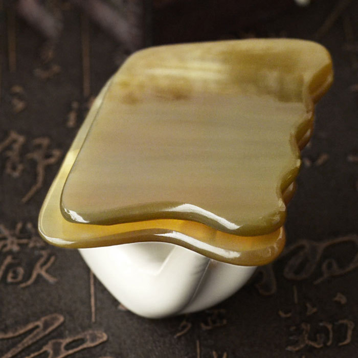 Ox horn wave shaped scraping board A