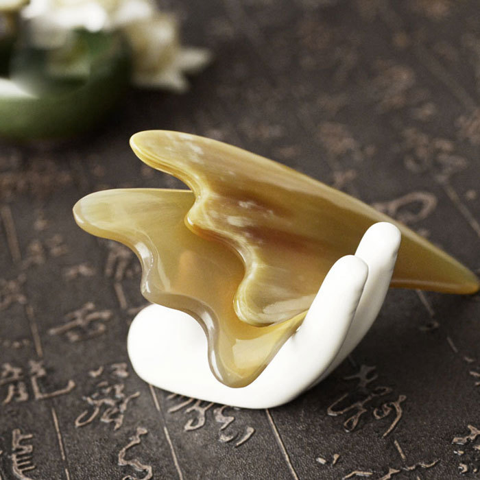 Horn triangular beauty scraping board