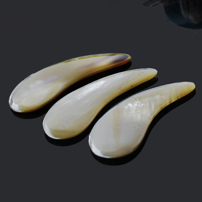 Horn comma beauty scraping board