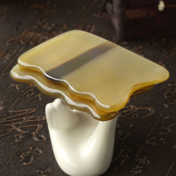 Ox horn wave shaped scraping board A