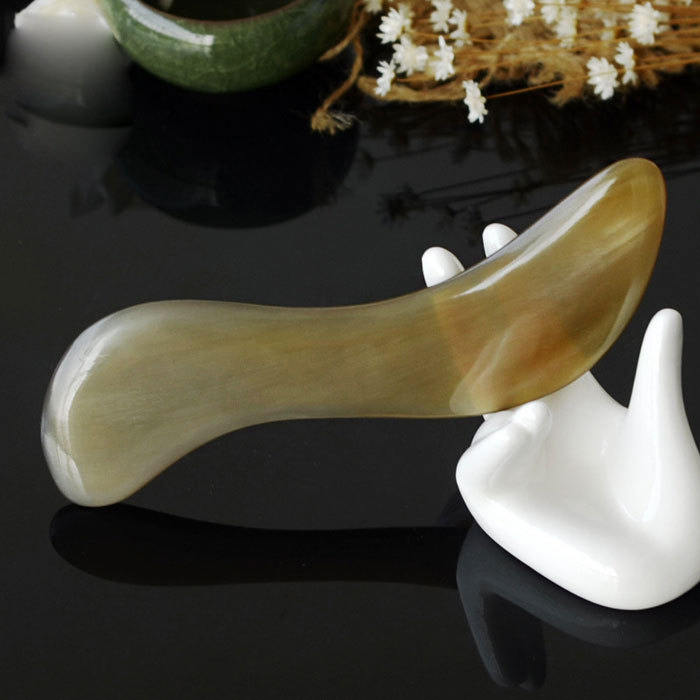 S-shaped horn beauty scraping board A