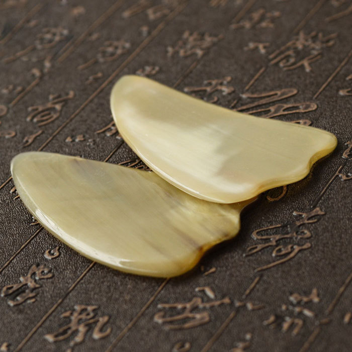 Triangular horn beauty scraping board