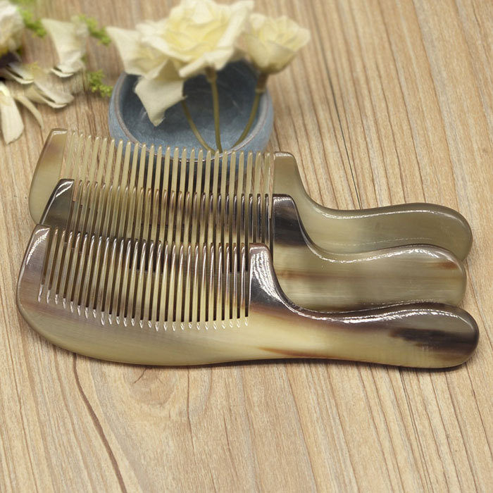 Black color small horn massage comb