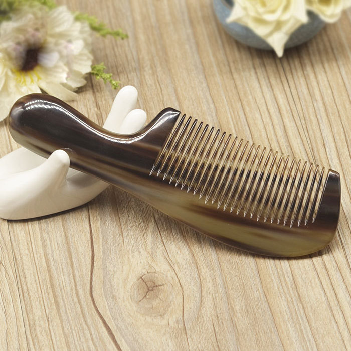 Black color small horn massage comb
