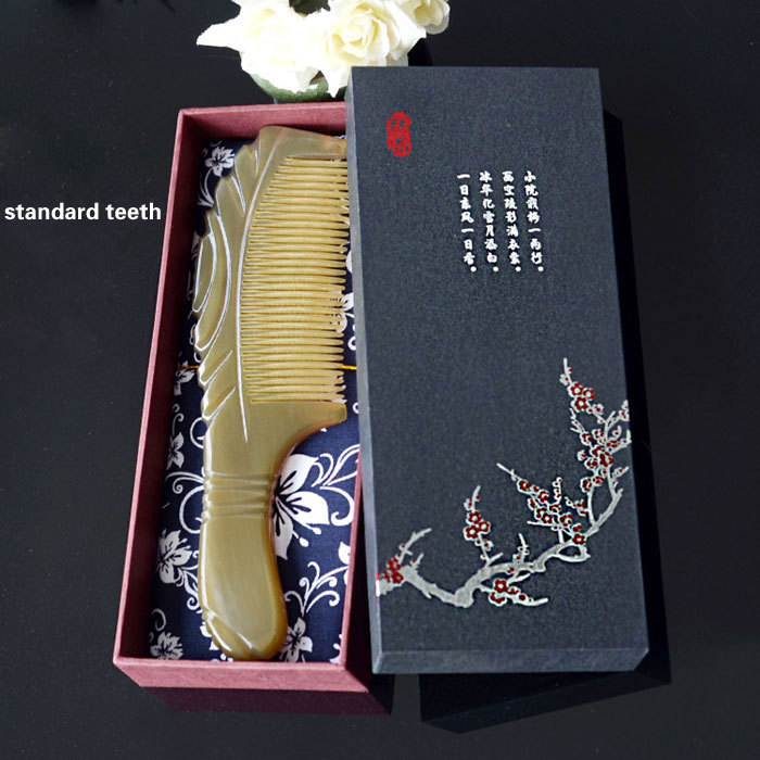 Gift box with large horn carving massage comb